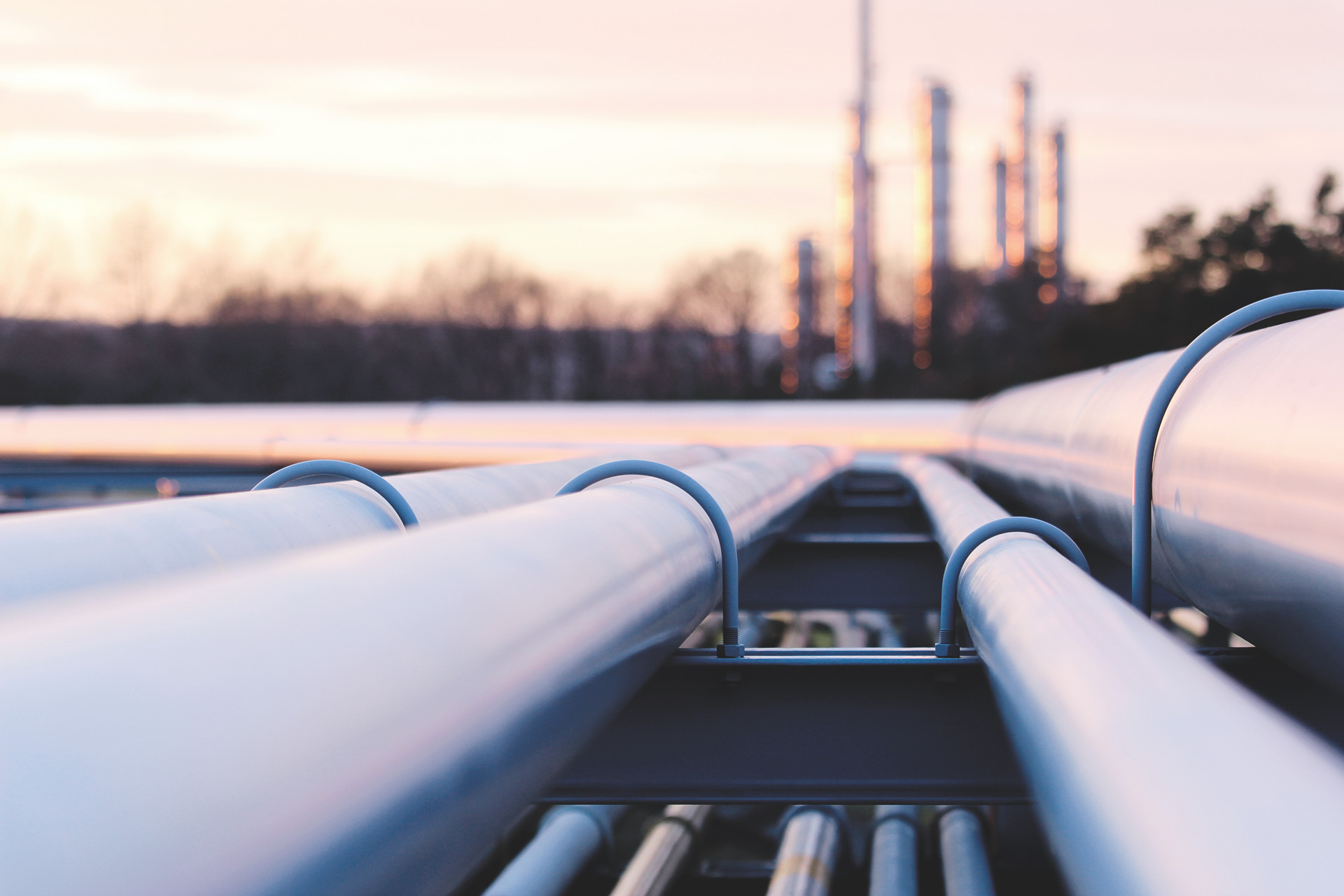 https://www.heritagewastesolutions.com/wp-content/uploads/2022/01/oil_gas_pipeline.jpg