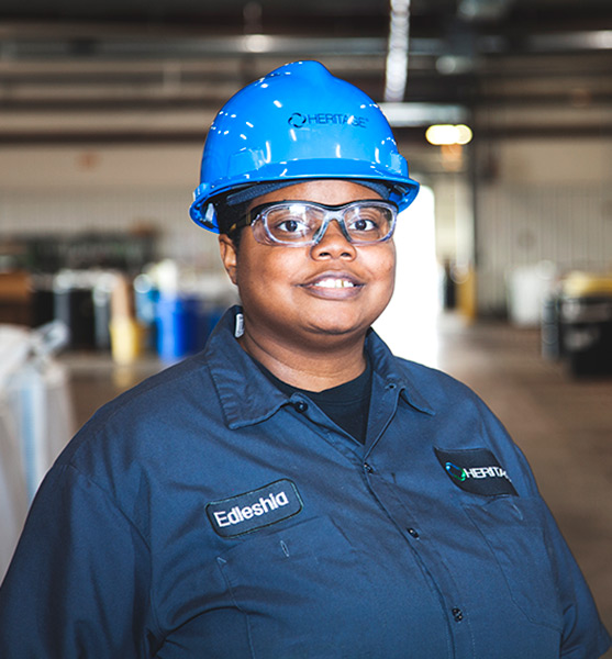 employee smiling in facility